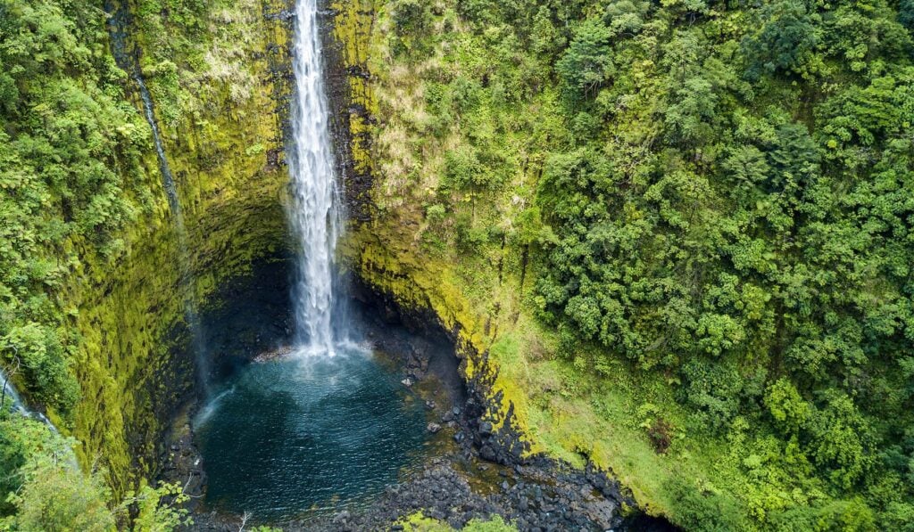 Aerial view straight down into a Big Island waterfall gorge and plunge pool